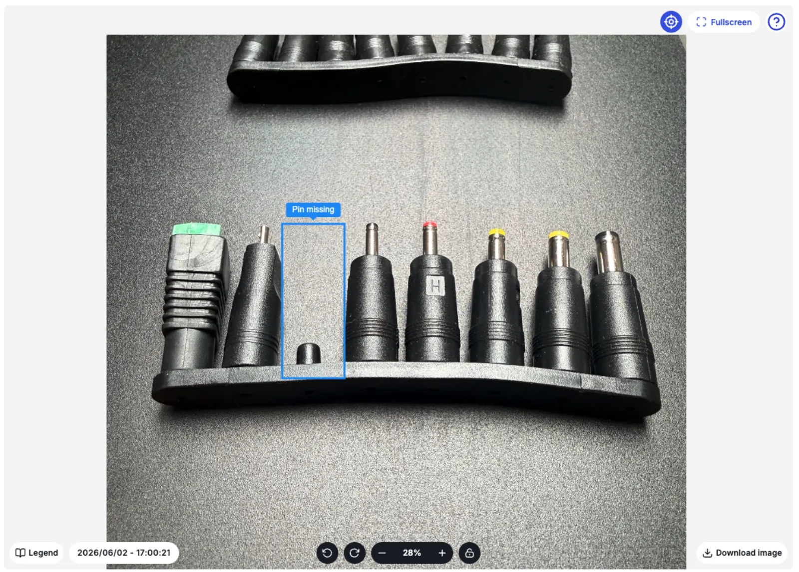 AI highlighting a missing pin on a connector assembly