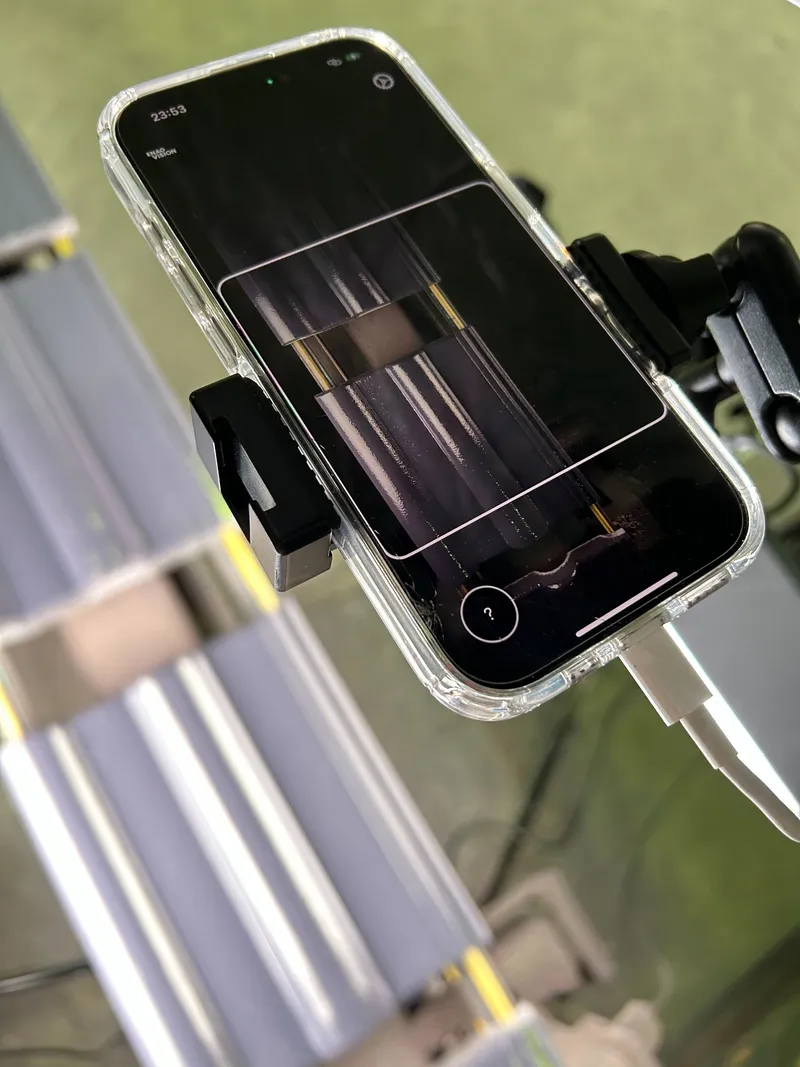 iPhone mounted on production line